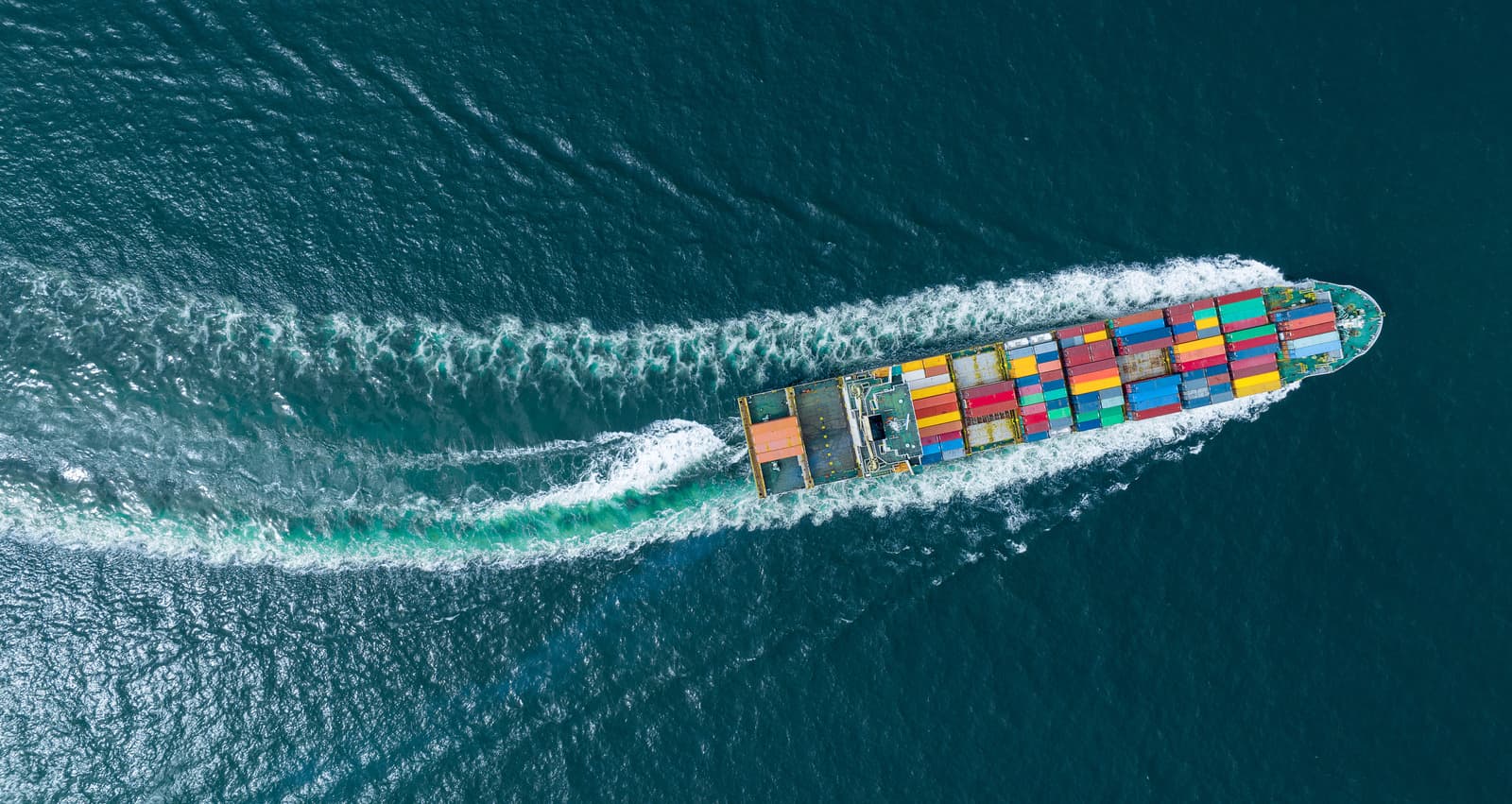 Aerial view of container ship at sea